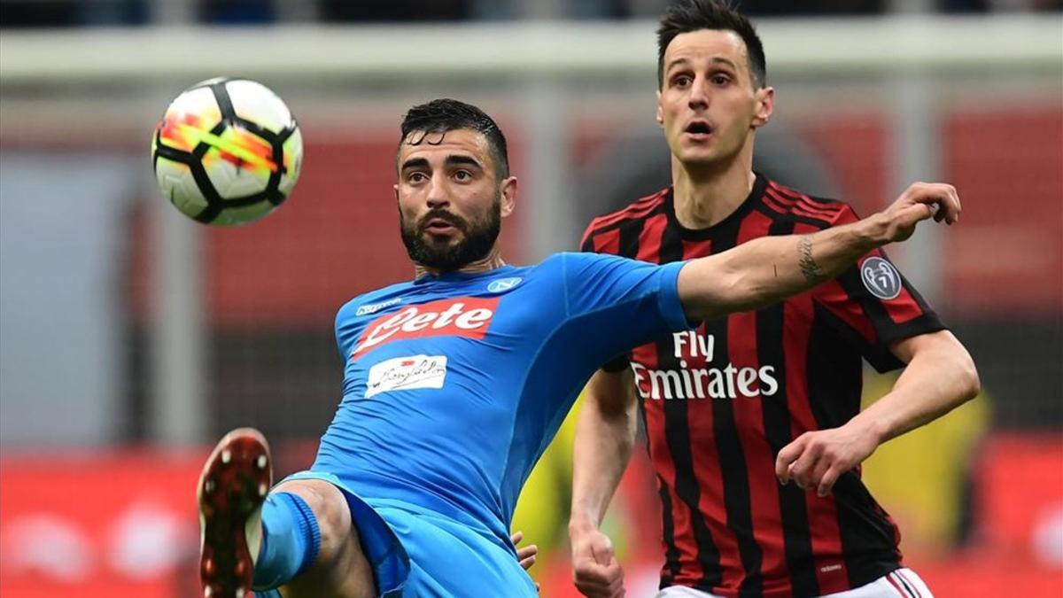 Raúl Albiol disputando un partido conta el AC Milan