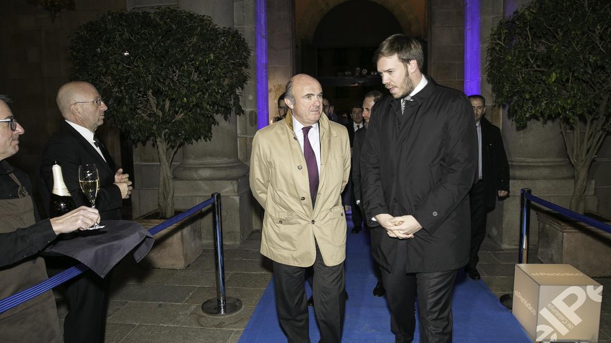 Guindos y Asensio a su llegada a la gala de los premios Empresa del Año 2017.