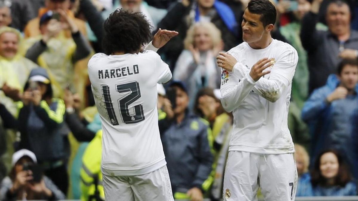 Cristiano y Marcelo celebran el primer tanto del delantero portugués