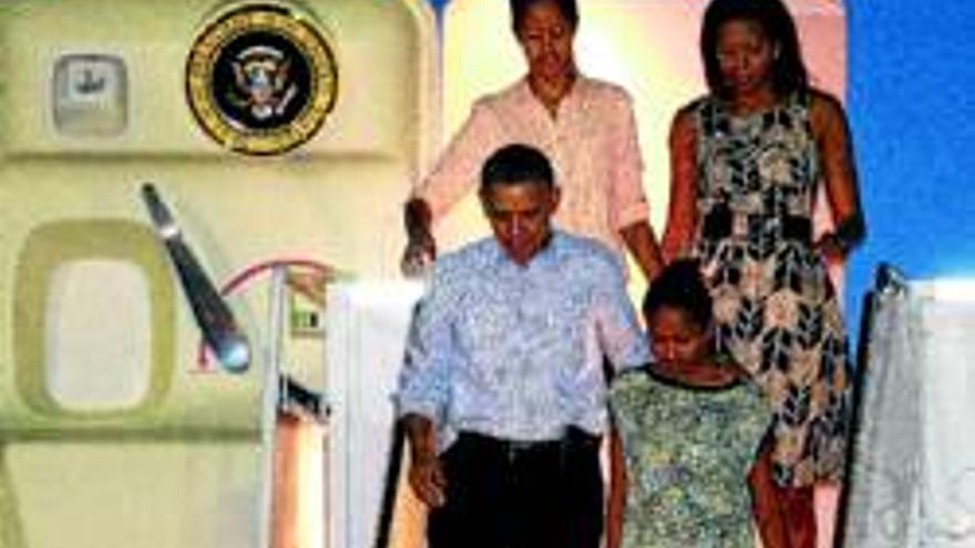 Barack Obama : EL PRESIDENTE VUELVE A CASA POR NAVIDAD