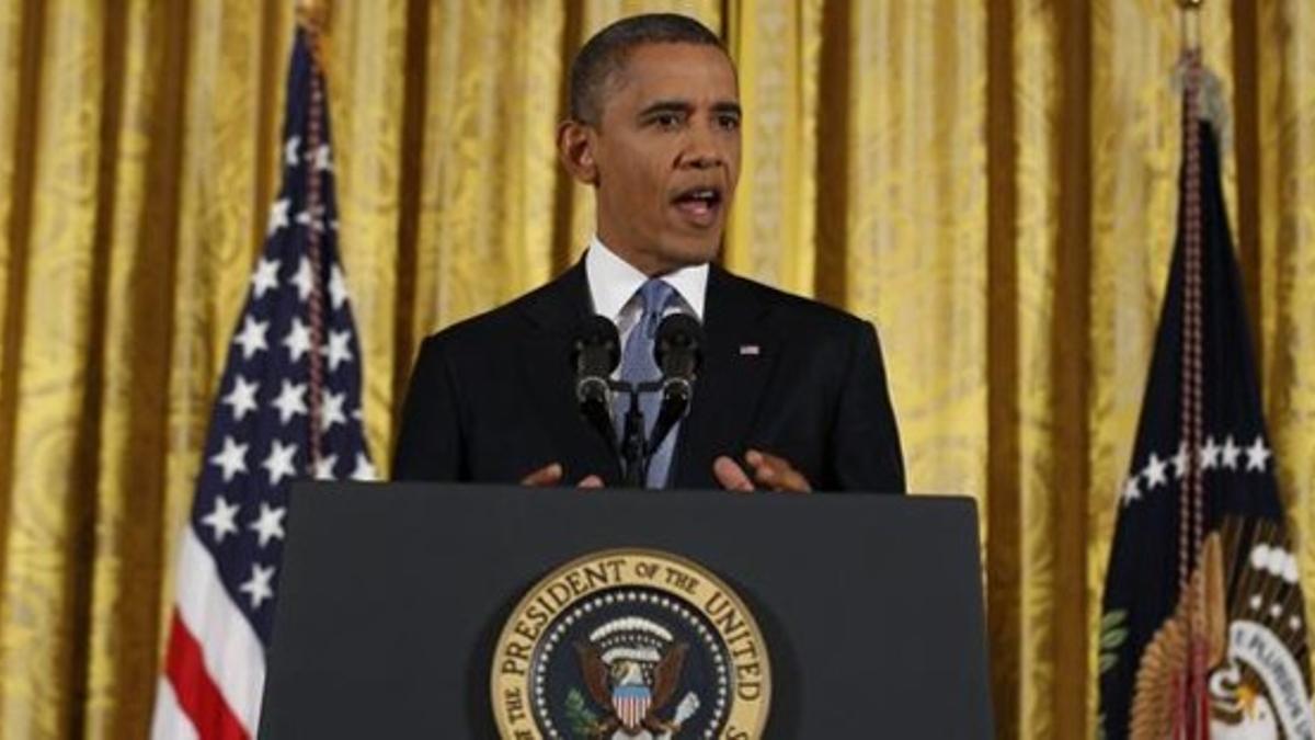 Obama habla en su primera rueda de prensa en la Casa Blanca, este miércoles en Washington.