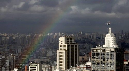 A rainbow appears over the sky of the city of Sao Paulo