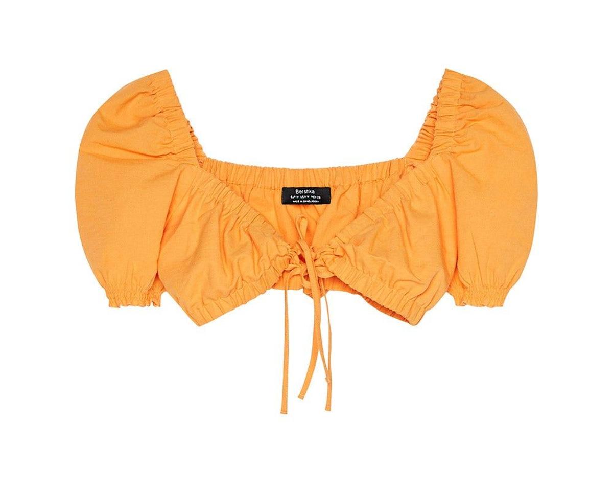 Top mandarina de Jessica Goicoechea x Bershka. (Precio: 15, 99 euros)