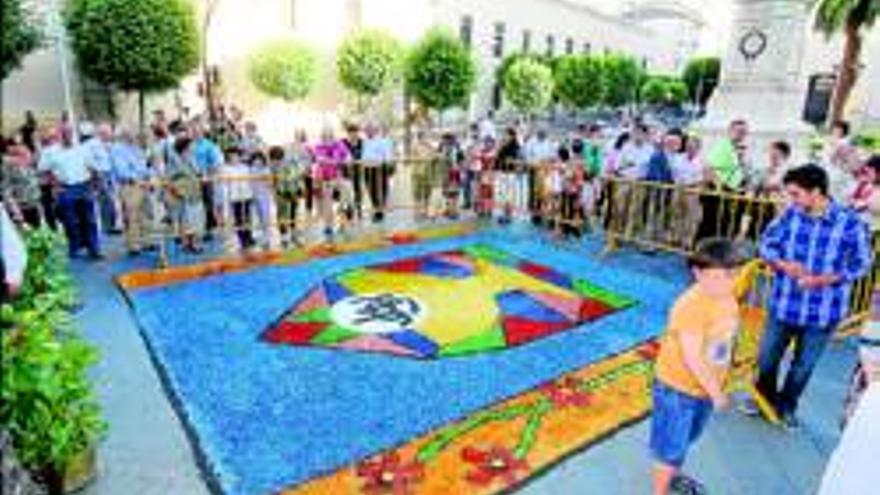 Una alfombra en Minayo por el día del Corpus