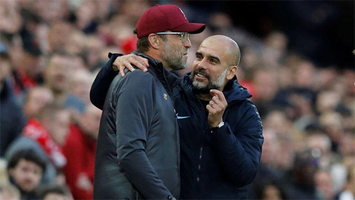 Klopp y Guardiola, en una imagen de esta temporada