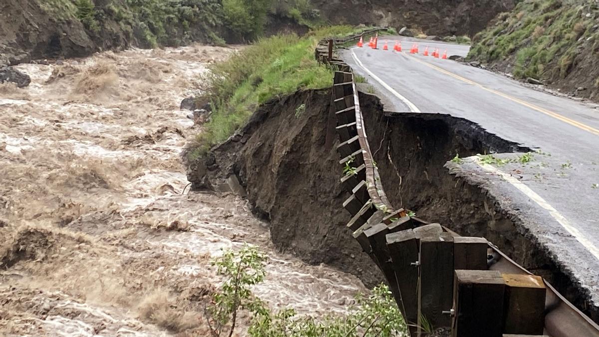 High water levels in the Gardner River erode Yellowstone National Park's North Entrance Road, where the park was closed due to heavy flooding, rockslides, extremely hazardous conditions near Gardiner, Montana, U.S. June 13, 2022. National Park Service/Handout via REUTERS. THIS IMAGE HAS BEEN SUPPLIED BY A THIRD PARTY.