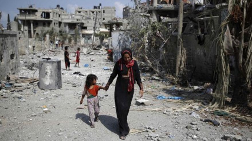 Los refugiados palestinos aprovechan el alto el fuego para volver a sus casas