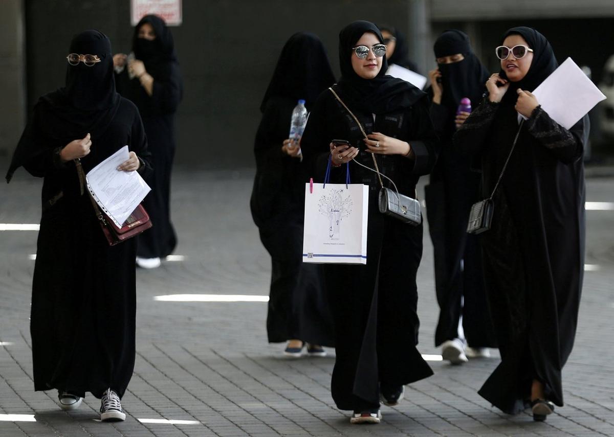 FILE PHOTO  Saudi students walk at the exhibition to guide job seekers at Glowork Women s Career Fair in Riyadh  Saudi Arabia October 2  2018  REUTERS Faisal Al Nasser File Photo