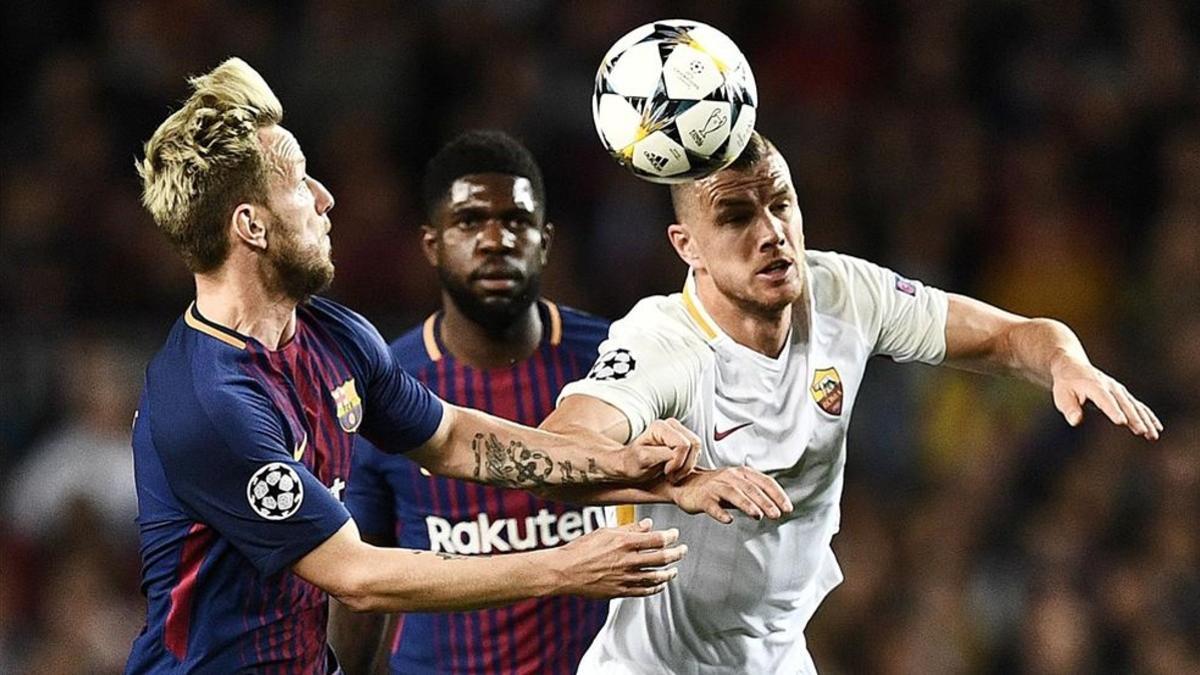 Un incansable Ivan Rakitic obstaculiza el avance de Edin Dzeko