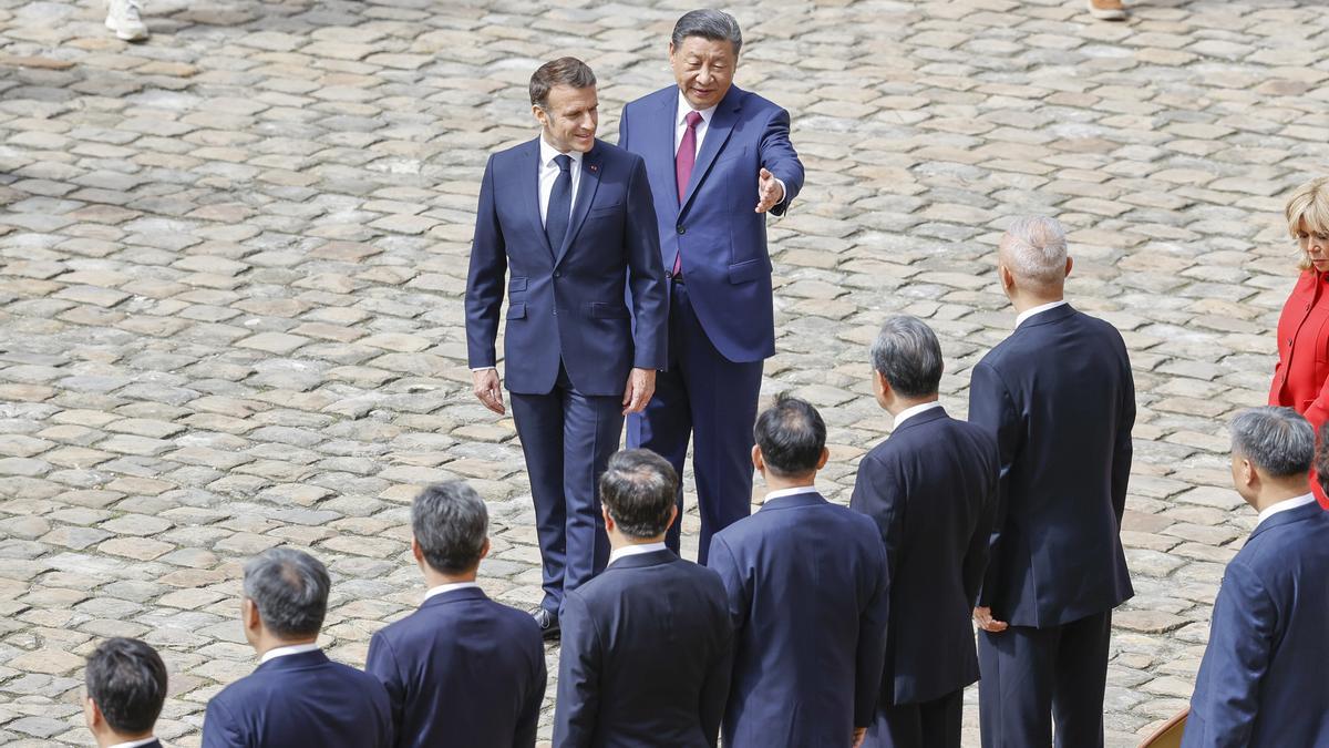 El presidente francés, Emmanuel Macron, y su homólogo chino, Xi Jinping