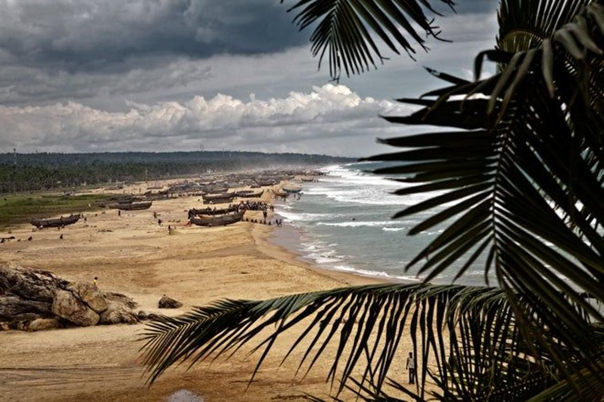 Pescadores en una playa de Kerala.