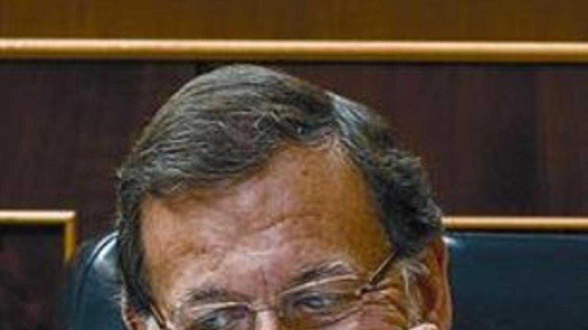 Mariano Rajoy, en su escaño, ayer durante el debate en el Congreso