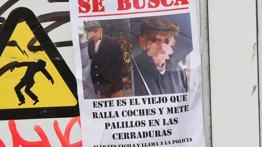 Cartel con el rostro del hombre en O Calvario // R. Grobas