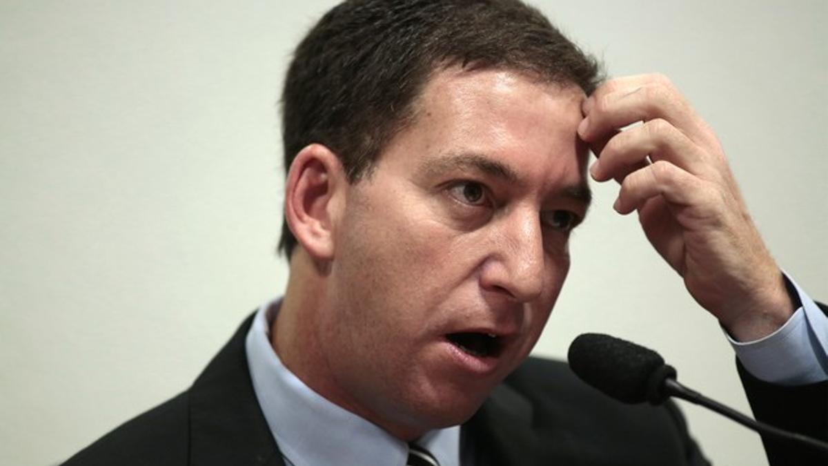 Glenn Greenwald, durante una comparecencia ante una comisión del Senado de Brasil que investiga un supuesto espionaje de EEUU, el pasado 9 de octubre en Brasilia.