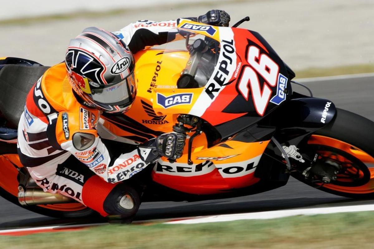 Honda MotoGP rider Pedrosa of Spain takes curve ... Honda MotoGP rider Pedrosa of Spain takes curve ...