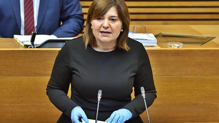 Bonig, con guantes, en la tribuna.