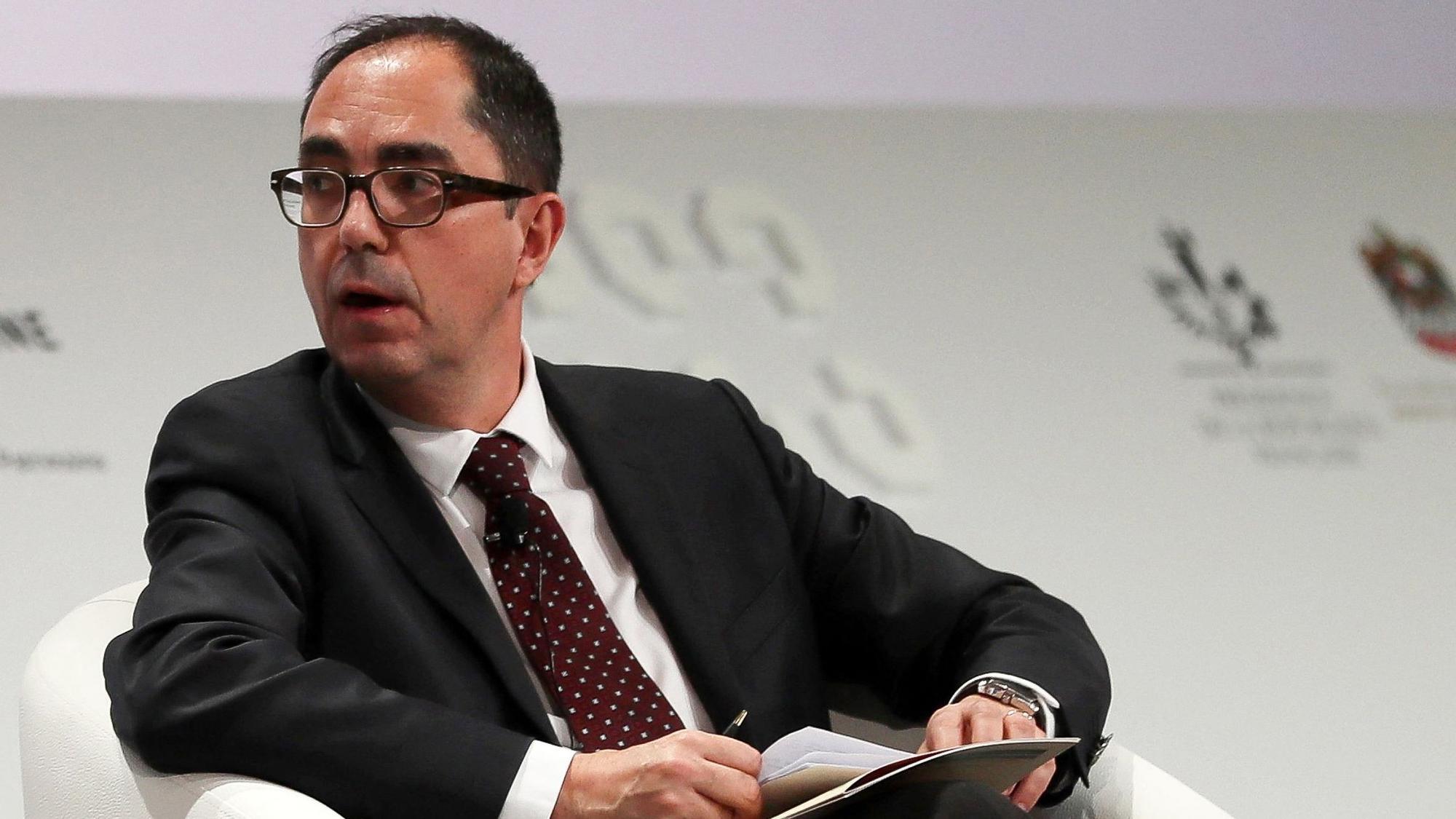 This file photo taken on December 2, 2016 shows President and Director of the Louvre Museum, Jean-Luc Martinez speaking during a conference gathering officials and experts from around the world gather to discuss forming a global alliance to protect endangered heritage sites in Abu Dhabi. - A former president-director of the Louvre Museum, Jean-Luc Martinez, was indicted on May 25, 2022 in Paris for &quot;money laundering and complicity in organised fraud&quot; and placed under judicial supervision in an investigation into trafficking in Near and Middle Eastern antiquities, a judicial source said on May 26, 2022. (Photo by KARIM SAHIB / AFP)