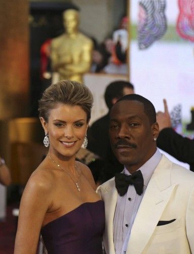 Actor Eddie Murphy and partner Paige Butcher arrive at the 87th Academy Awards in Hollywood