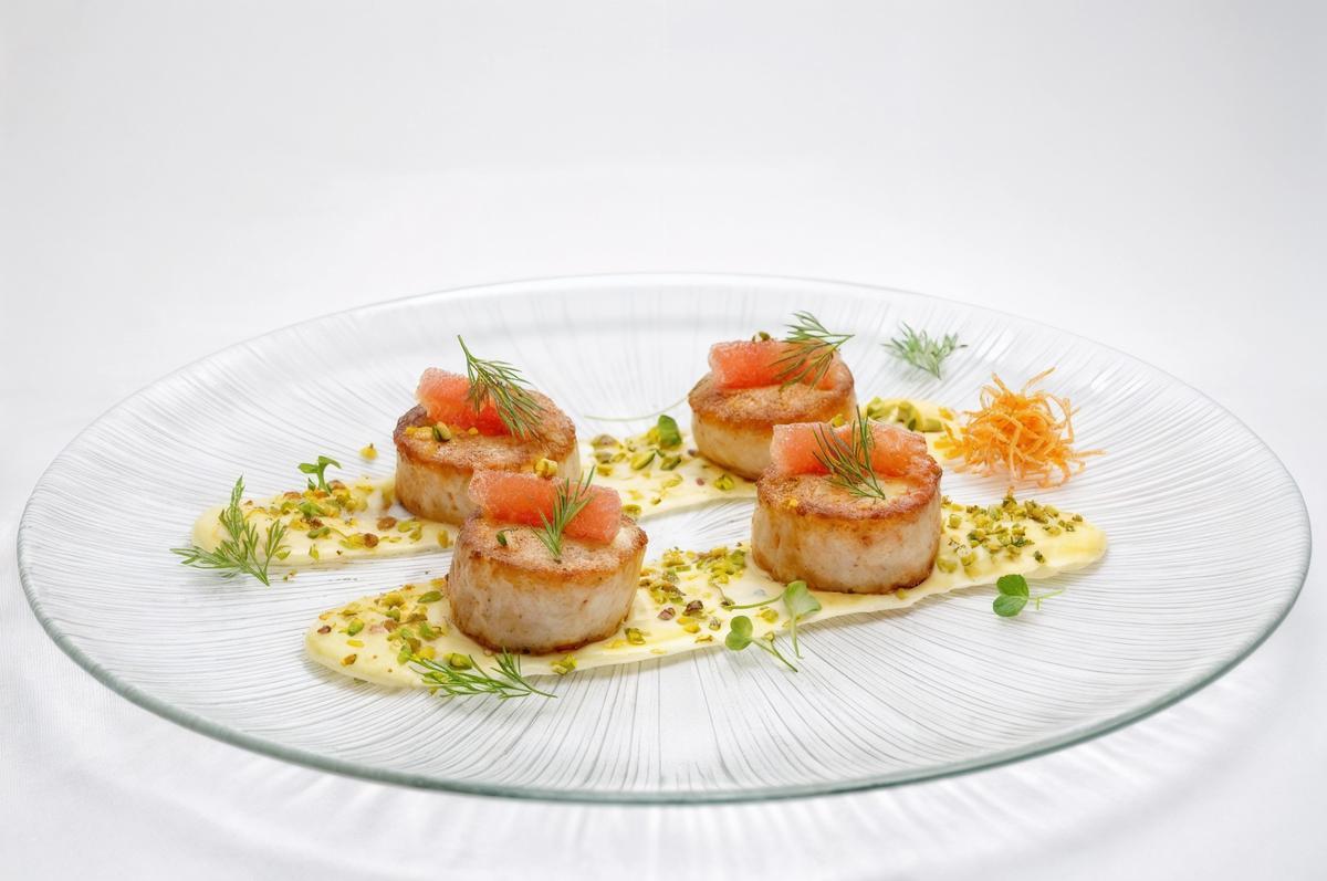 Vieira templada con pomelo.