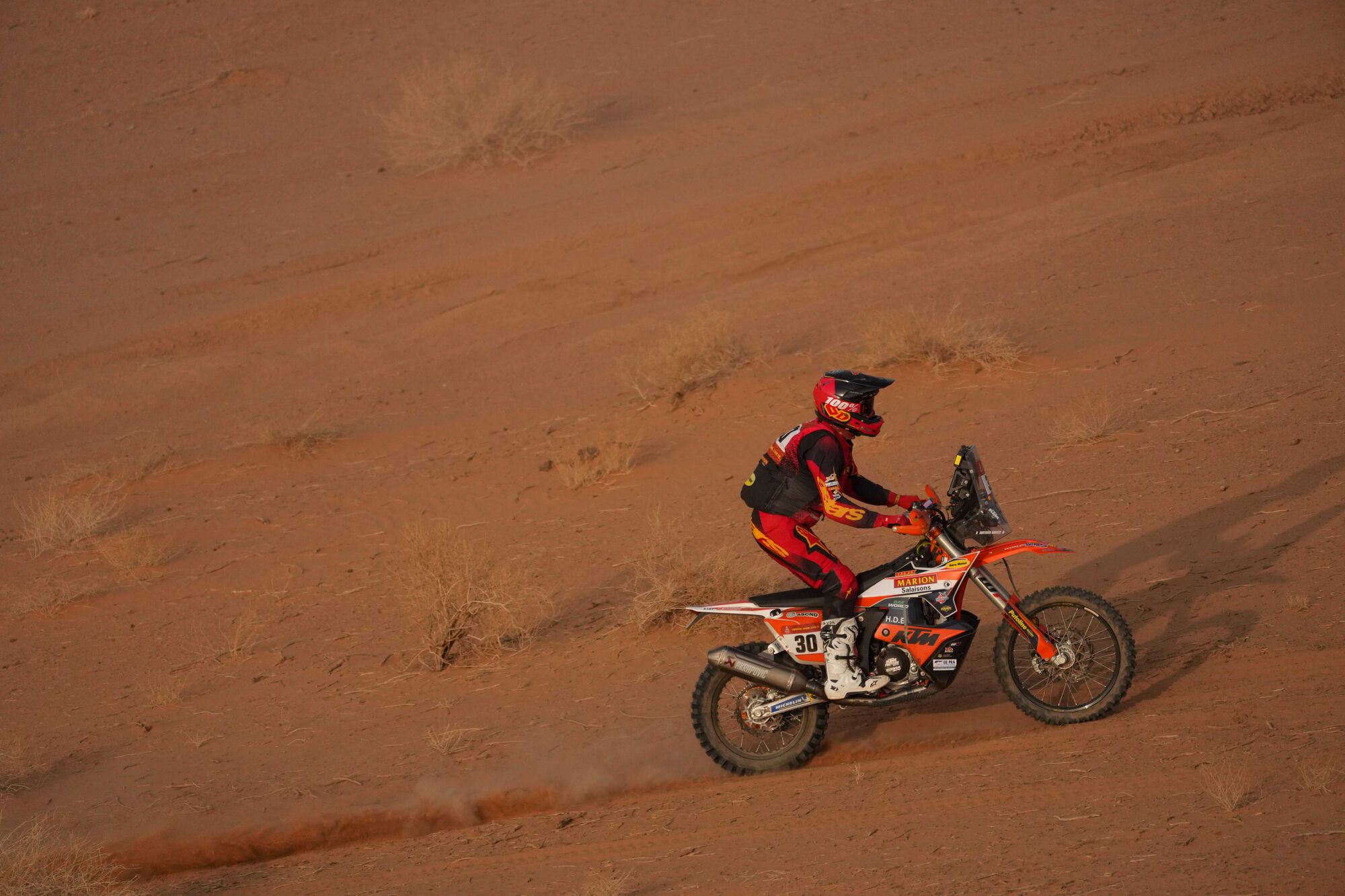 Rider Mathieu Doveze competes during the third stage of the Dakar Rally with a start and finish in Alula, Saudi Arabia, Tuesday, Jan. 6, 2026. (AP Photo/Thibault Camus)