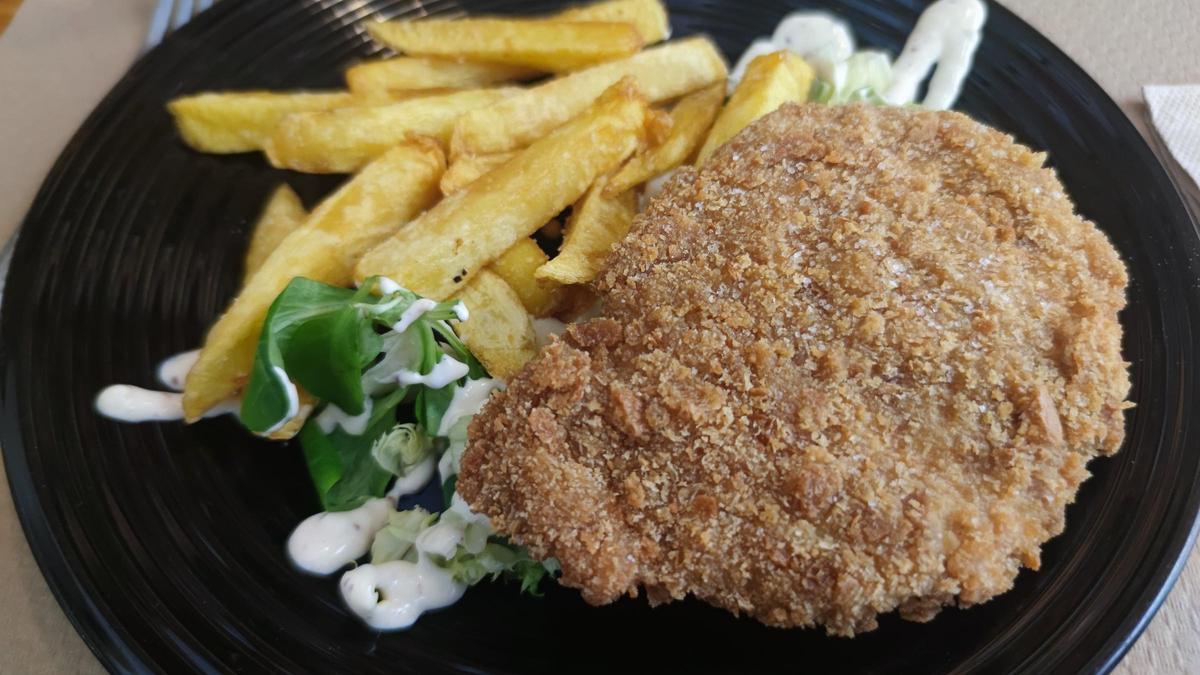 El lomo rebozado con patatas de Bodega 1940.