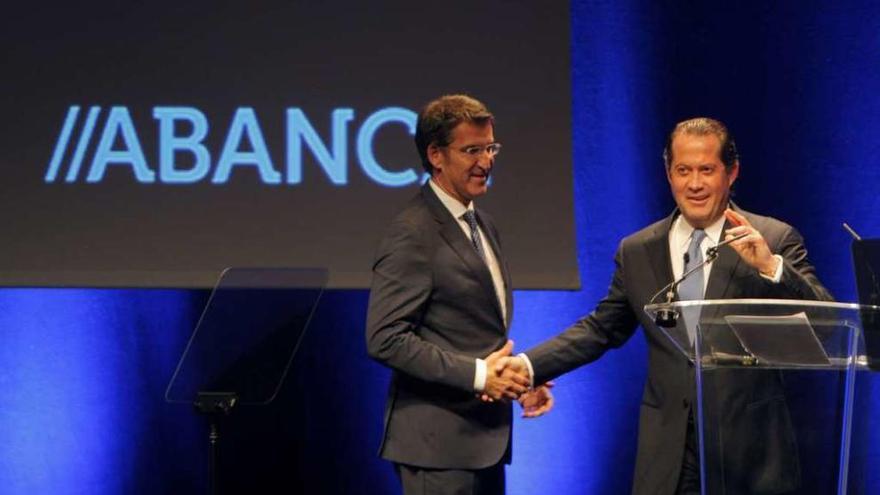 Alberto Núñez Feijóo y Juan Carlos Escotet durante la presentación de Abanca, la nueva marca de NCG.