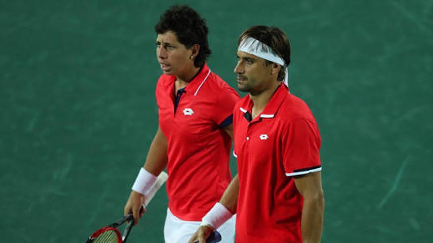 David Ferrer y Carla Suárez, eliminados del dobles mixto.