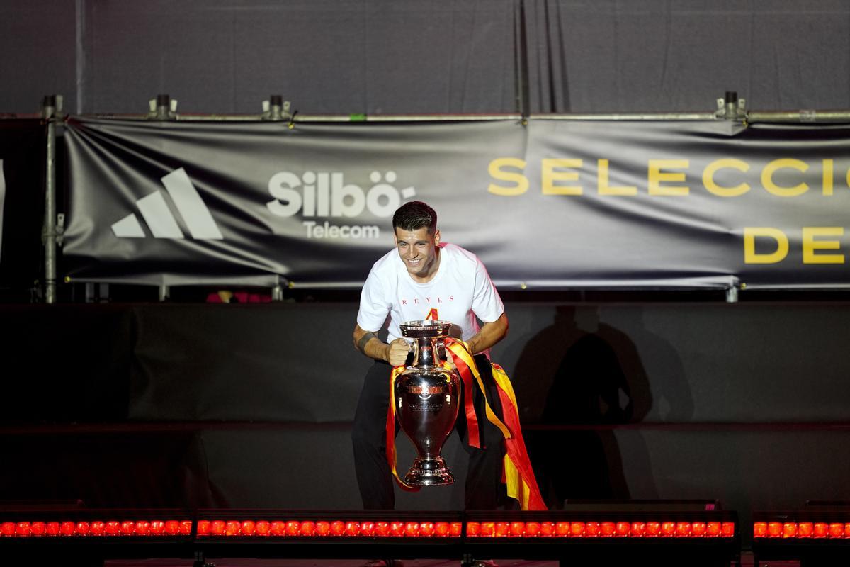 Alvaro Morata celebrates with the trophy during the celebration of Spain Team at Cibeles Palace of Madrid after winning the Eurocup 2024 against Englad on July 15, 2024 in Madrid, Spain.