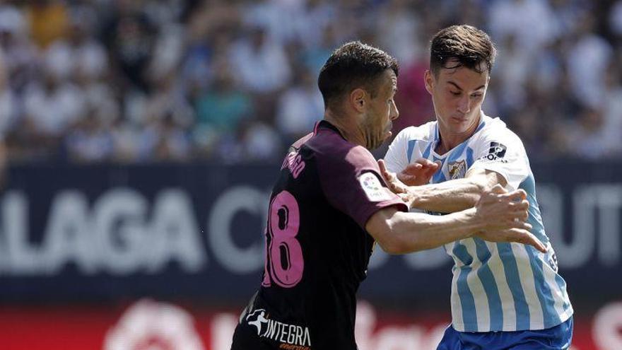 Juanpi fue de los más activos del Málaga CF ante el Sporting.