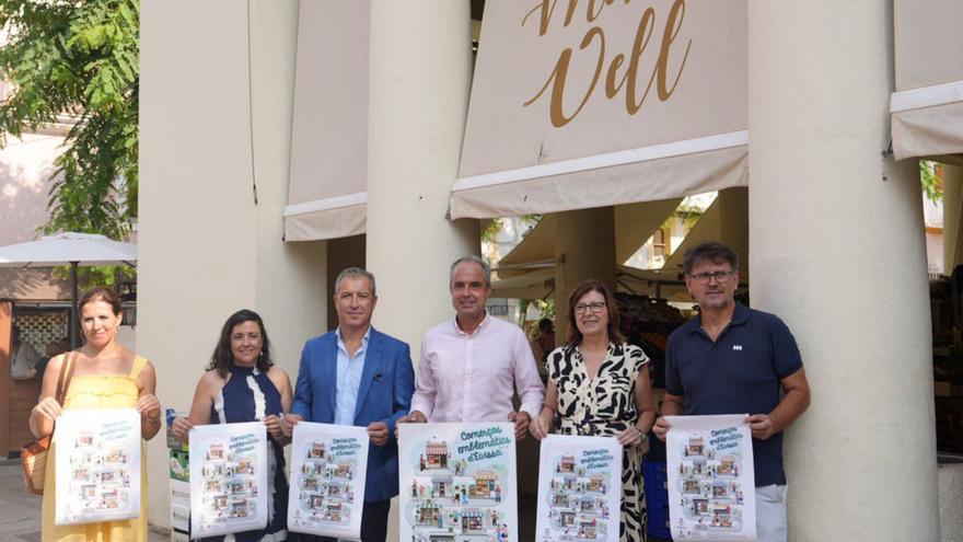 Presentación de la ruta por los comercios ‘emblemáticos’ en el Mercat Vell. | CIE