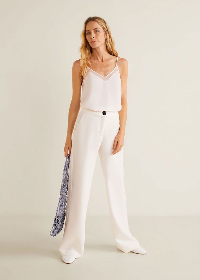Desde que vimos a Olivia Palermo con este top lencero, queremos encontrar  uno igual en Zara, Mango, H&M... - Woman
