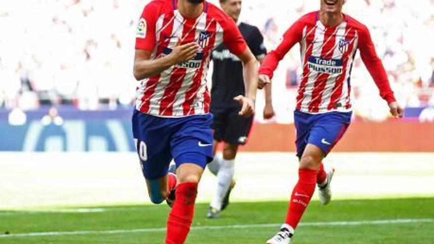 Carrasco y Griezmann, autores de los goles atléticos.