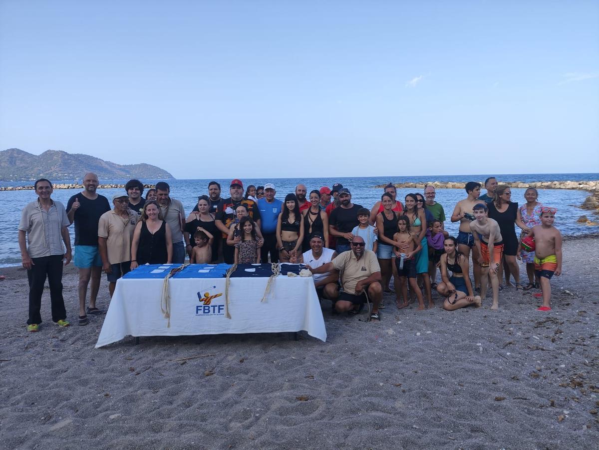 Imagen de los organizadores y los premiados.