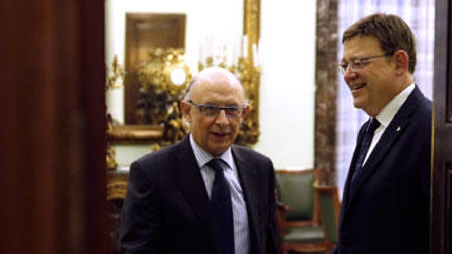 Puig, ayer con el ministro de Hacienda en Madrid