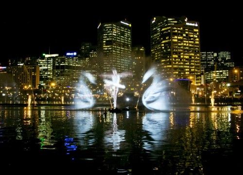 A light show is projected onto water by the Vivid Aquatique Water Theatre during a preview of the Vivid Sydney light and music festival