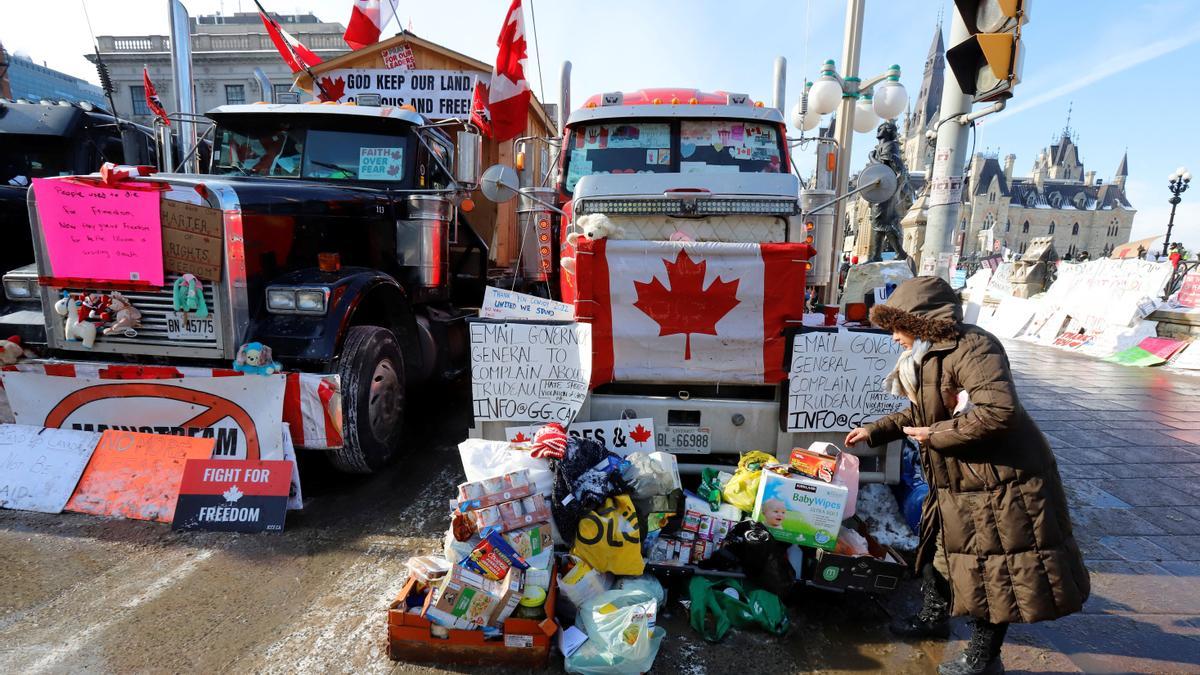 A person looks over the truckers' supplies as truckers and their supporters continue to protest coronavirus disease (COVID-19) vaccine mandates, in Ottawa, Ontario, Canada, February 7, 2022. REUTERS/Patrick Doyle