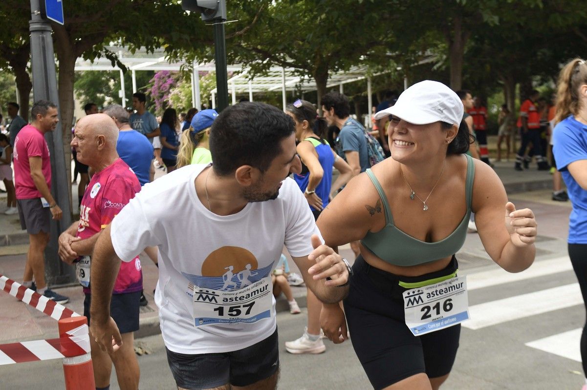 La carrera y marcha Solidaria Asteamur, en imágenes