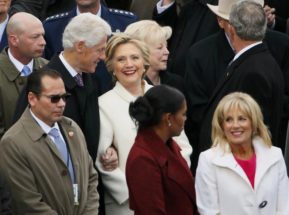 Michelle Obama and Dr Jill Biden stand near ...