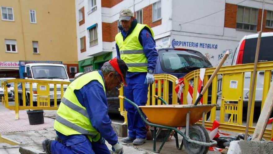 Dos trabajadores de la construcción.