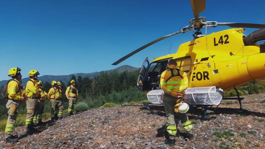 Una unidad de la Brifor se dispone a entrar en un helicóptero. | | E.D.