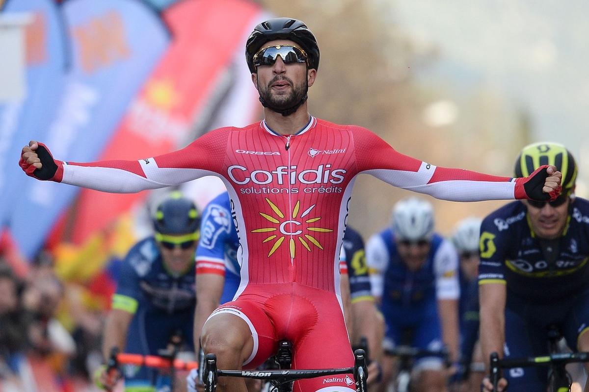 Cofidis’ French cyclist Nacer Bouhanni celebrates as he crosses the finish line winning the fourth stage of the 97th Volta Catalunya 2017, a 194,3 km ride from Llivia to Igualada on March 23, 2017.  / AFP PHOTO / Josep Lago