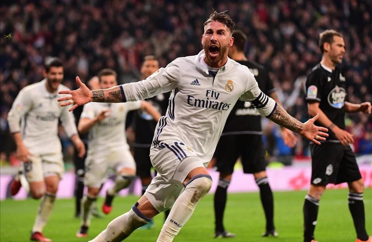 undefined36582752 real madrid s defender sergio ramos celebrates after scoring170102171211