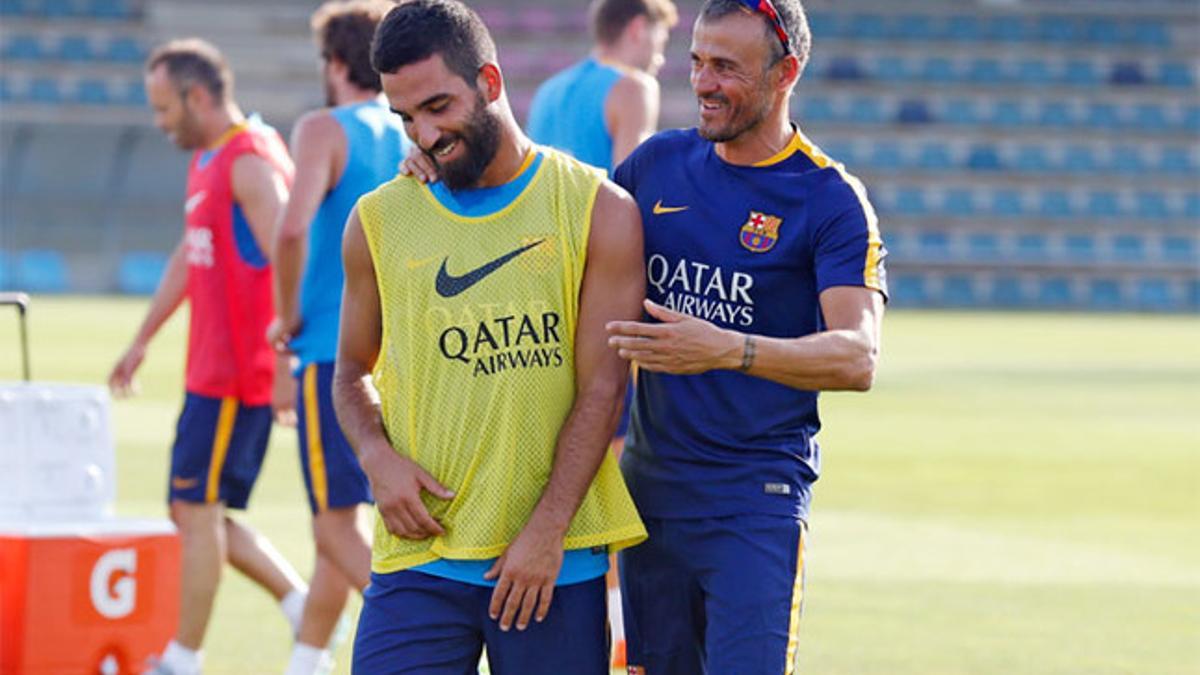 Arda Turan, junto a Luis Enrique