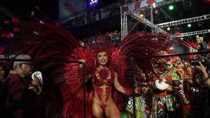 Drum queen Virginia Fonseca from Grande Rio samba school performs during Carnival celebrations at the Sambadrome in Rio de Janeiro, Wednesday, Feb. 18, 2026. (AP Photo/Silvia Izquierdo)