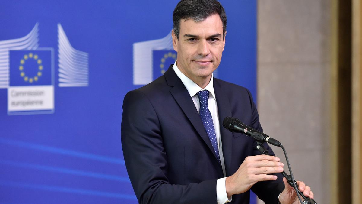 Spanish Prime Minister Pedro Sanchez looks on after arriving to take part in an emergency European Union leaders summit on immigration, in Brussels