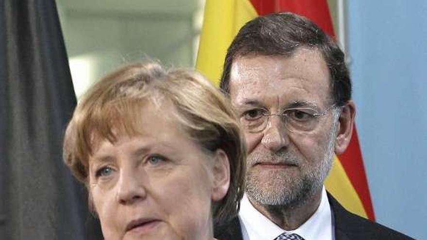 Merkel y Rajoy, tras una de sus reuniones de trabajo. / juanjo martín