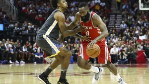 Jan 20, 2018; Houston, TX, USA; Houston Rockets guard James Harden (13) dribbles the ball as Golden State Warriors guard Nick Young (6) defends during the second quarter at Toyota Center. Mandatory Credit: Troy Taormina-USA TODAY Sports