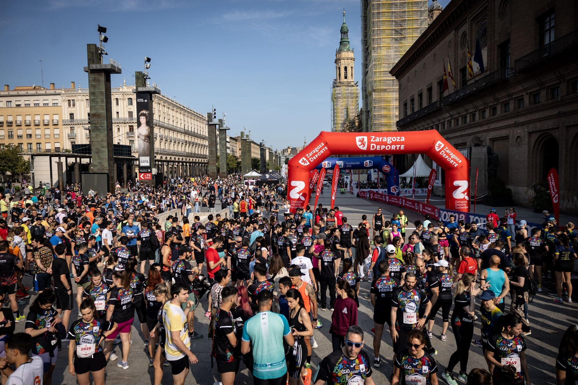 En imágenes | La carrera Ponle Freno sca a la calle a miles de personas en Zaragoza