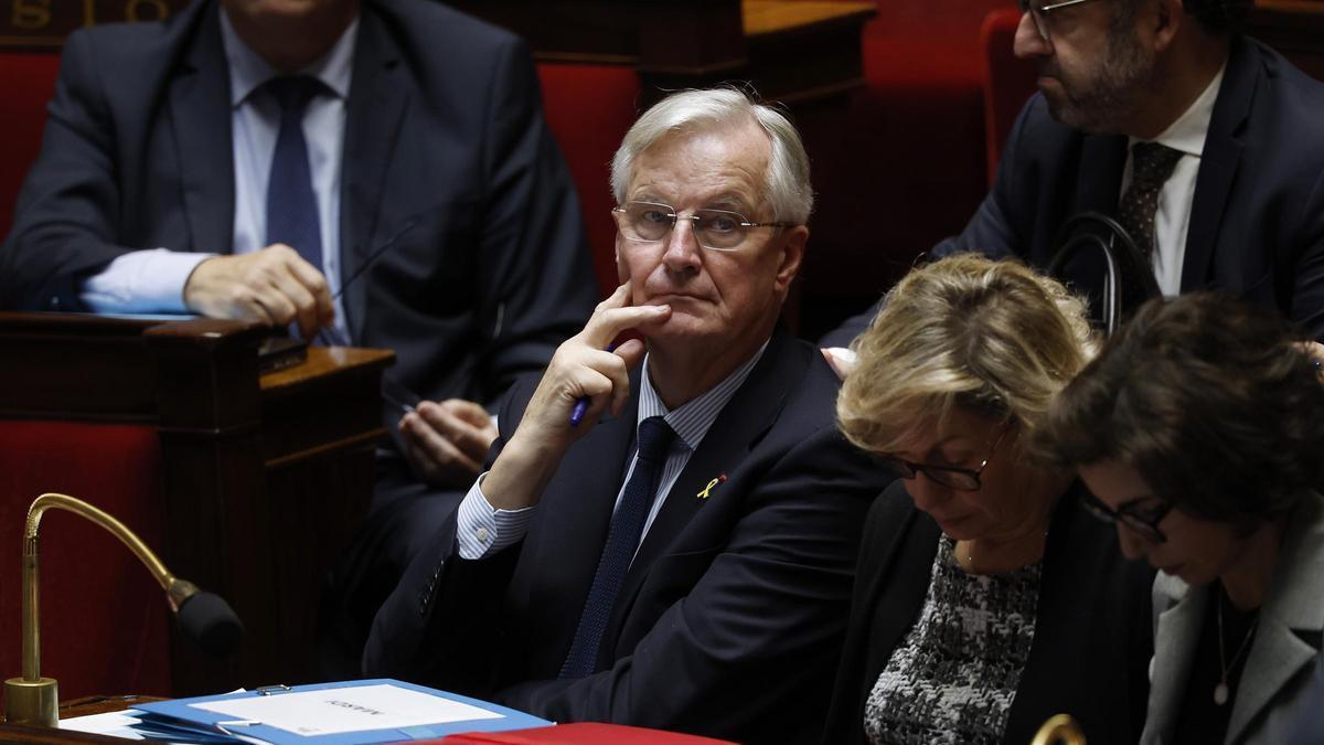 El primer ministro francés, Michel Barnier, durante el debate de la moción de censura, este martes en la Asamblea Nacional.