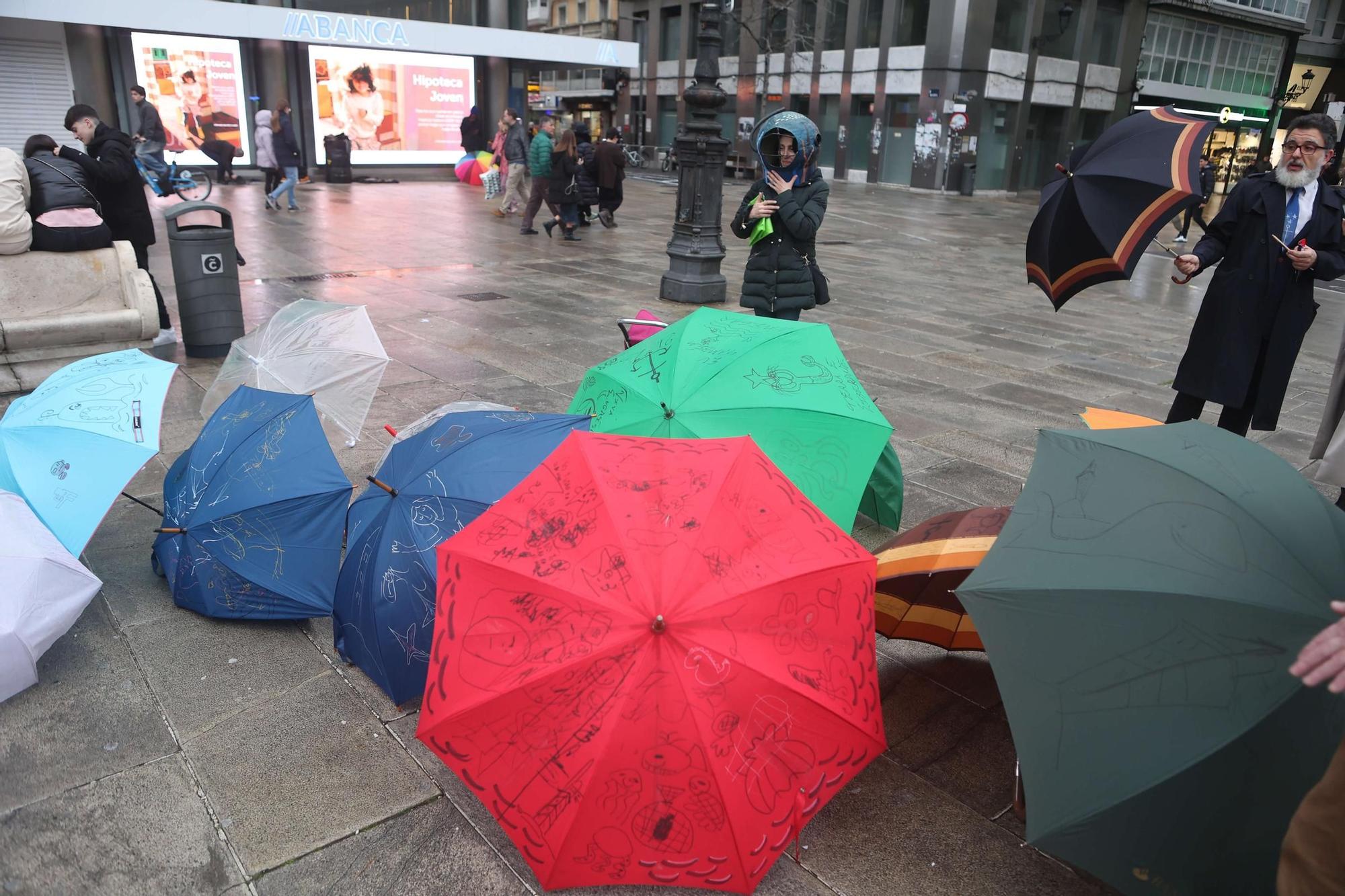 Pintada de paraguas en honor a Urbano Lugrís